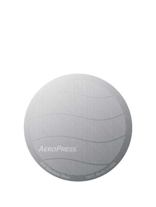 Gray AeroPress coffee maker on a white background