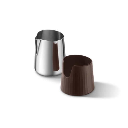 Silver milk pitcher and brown silicon sleeve on a white background