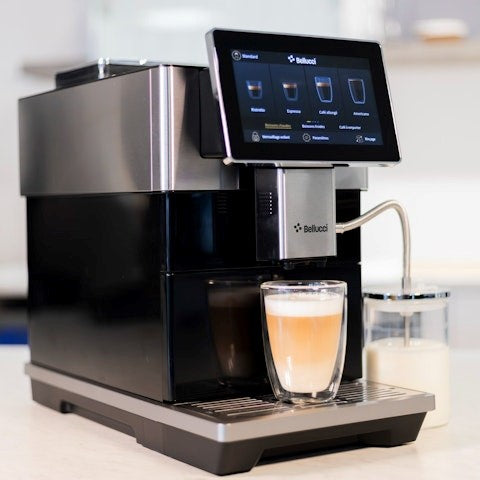 Bellucci Bistro fully automatic espresso machine with a cup of coffee on a kitchen counter