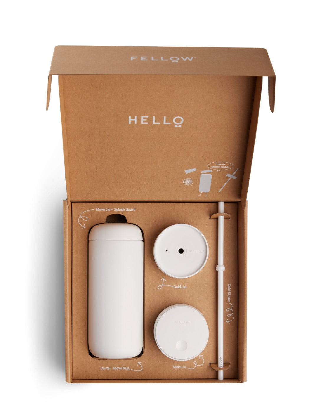 Fellow Carter kit with white mug, lids, and spout in a brown box on a white background