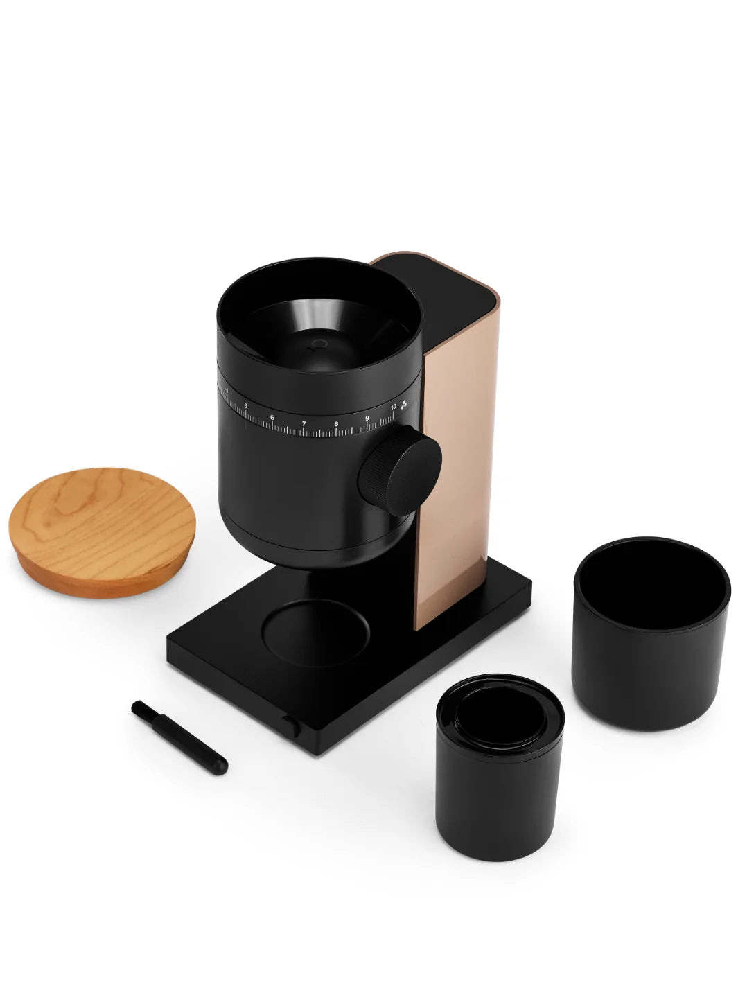 Black coffee maker with wooden lid and two black cups on a white background