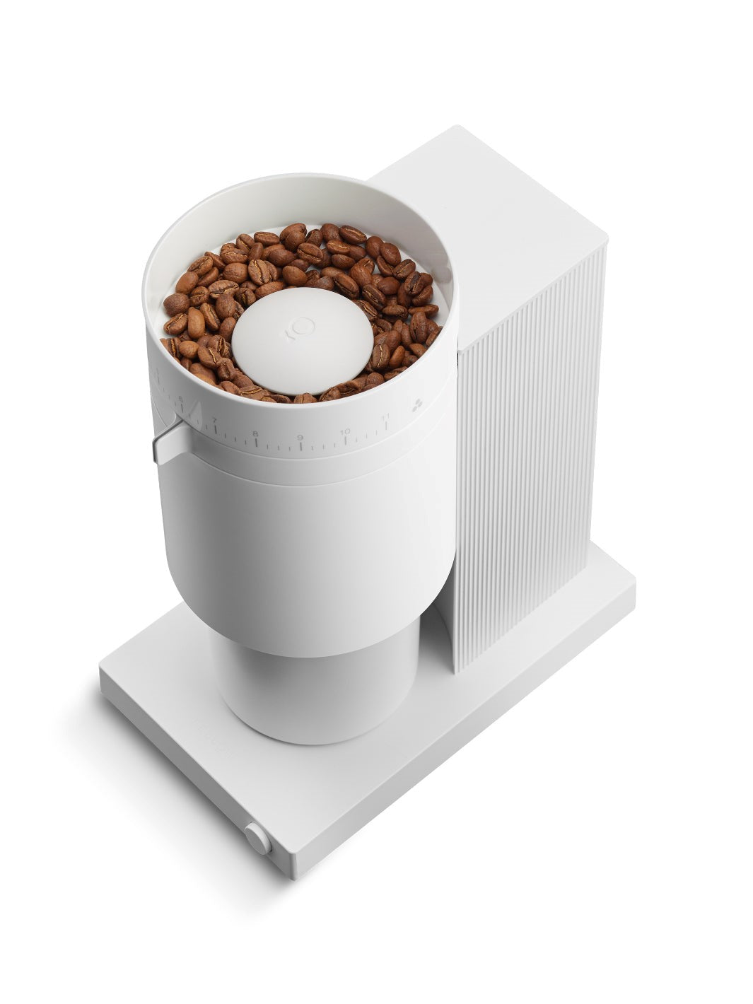 White coffee grinder with coffee beans on a white background