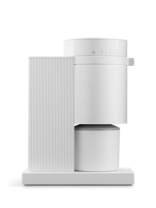 White coffee grinder side view on a white background