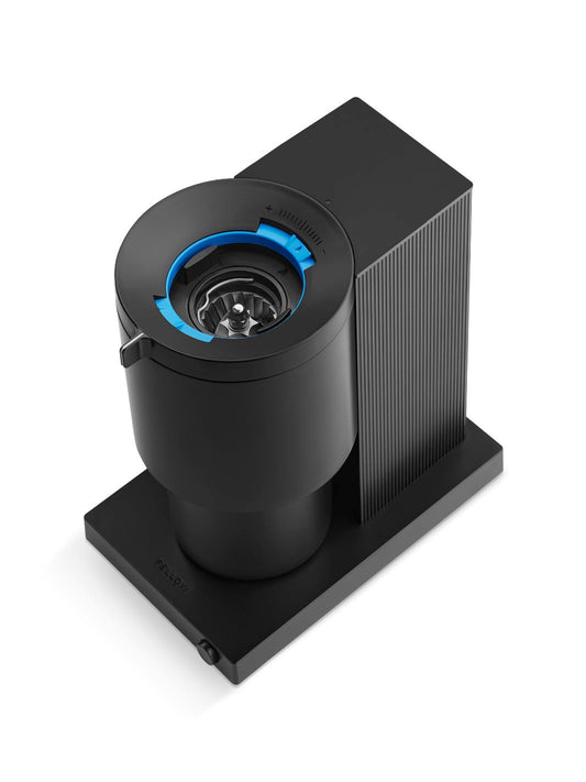 Black coffee grinder with blue adjustment ring on a white background