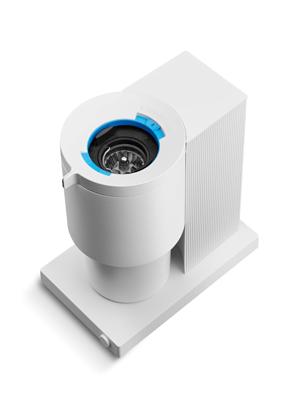 White coffee grinder with blue adjustment ring and view of the burrs