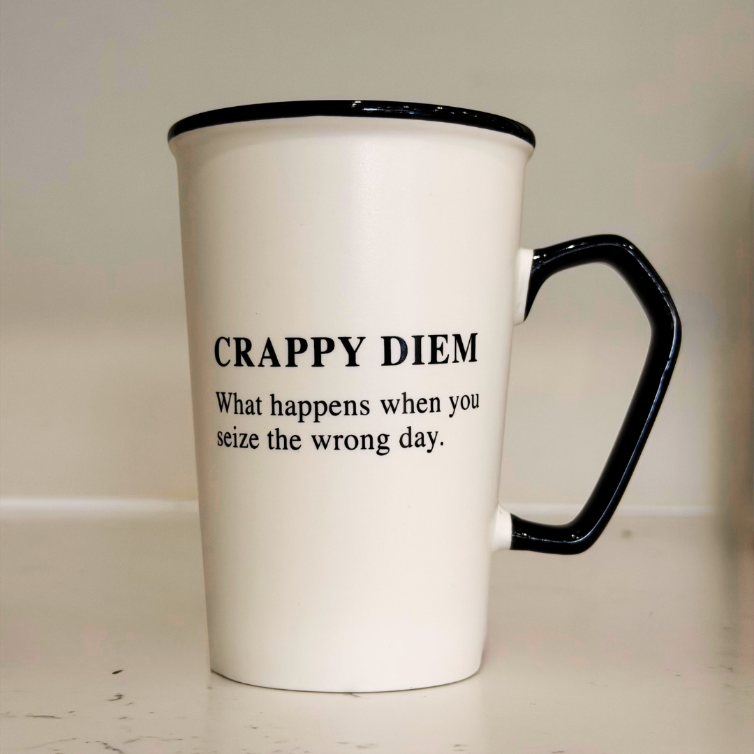White mug with black text
