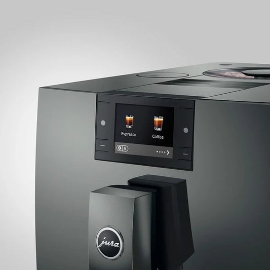 Gray coffee machine with digital display on a white background