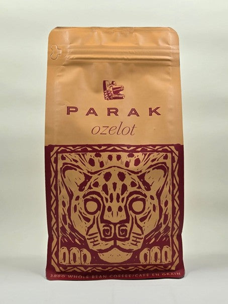 A package of PARAK Ozelot Medium-Light Roast coffee beans featuring an ocelot design on the front.