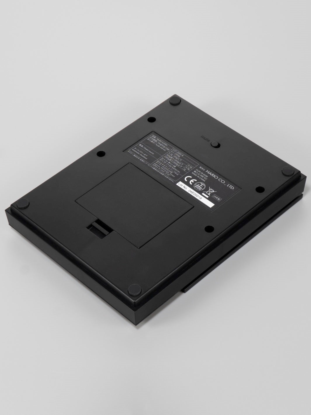 Black Hario coffee scale bottom view on a white background