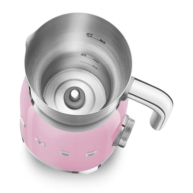 Pink Smeg kettle on a white background