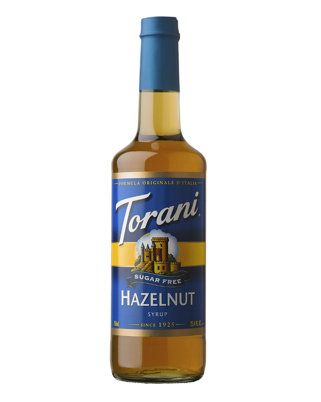 Torani Sugar Free Hazelnut, Glass bottle with Blue Lable, Image of castle on bottle lable with gold bands.