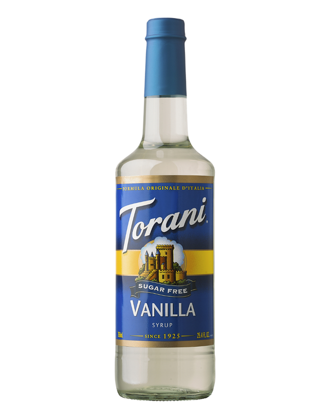 Torani Vanilla syrup bottle on a white background