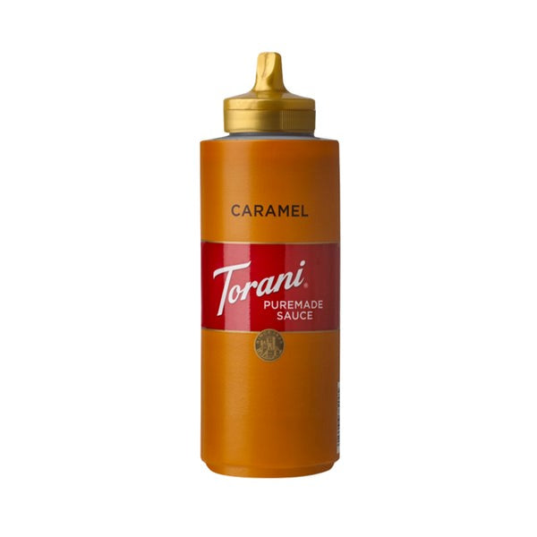 A bottle of Torani Caramel Sauce with a label and cap, against a white background.