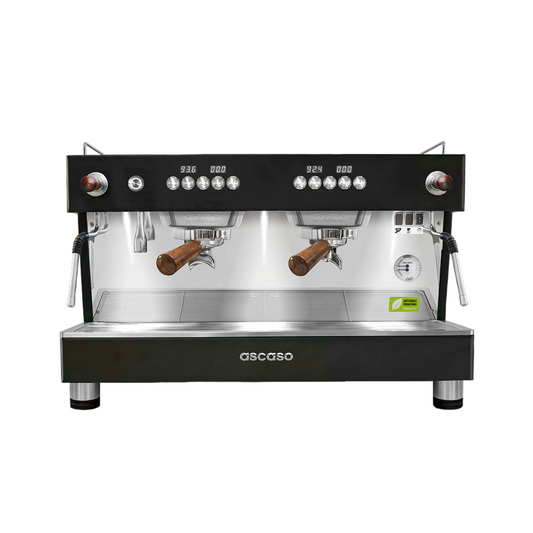 A white Ascaso Barista T One Raised 2 Group espresso machine with a joystick, featuring two coffee dispensers and a digital display.