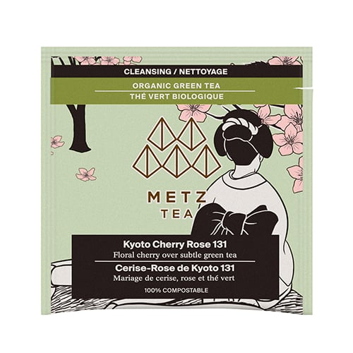 Bag of tea with an image of a lady sitting under a cherry blossom tree.