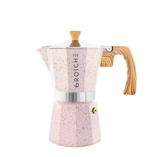 A pink speckled stovetop moka pot with a light wood handle and lid knob, featuring the brand name 'GROSCHE' printed vertically on the side, set against a plain white background.