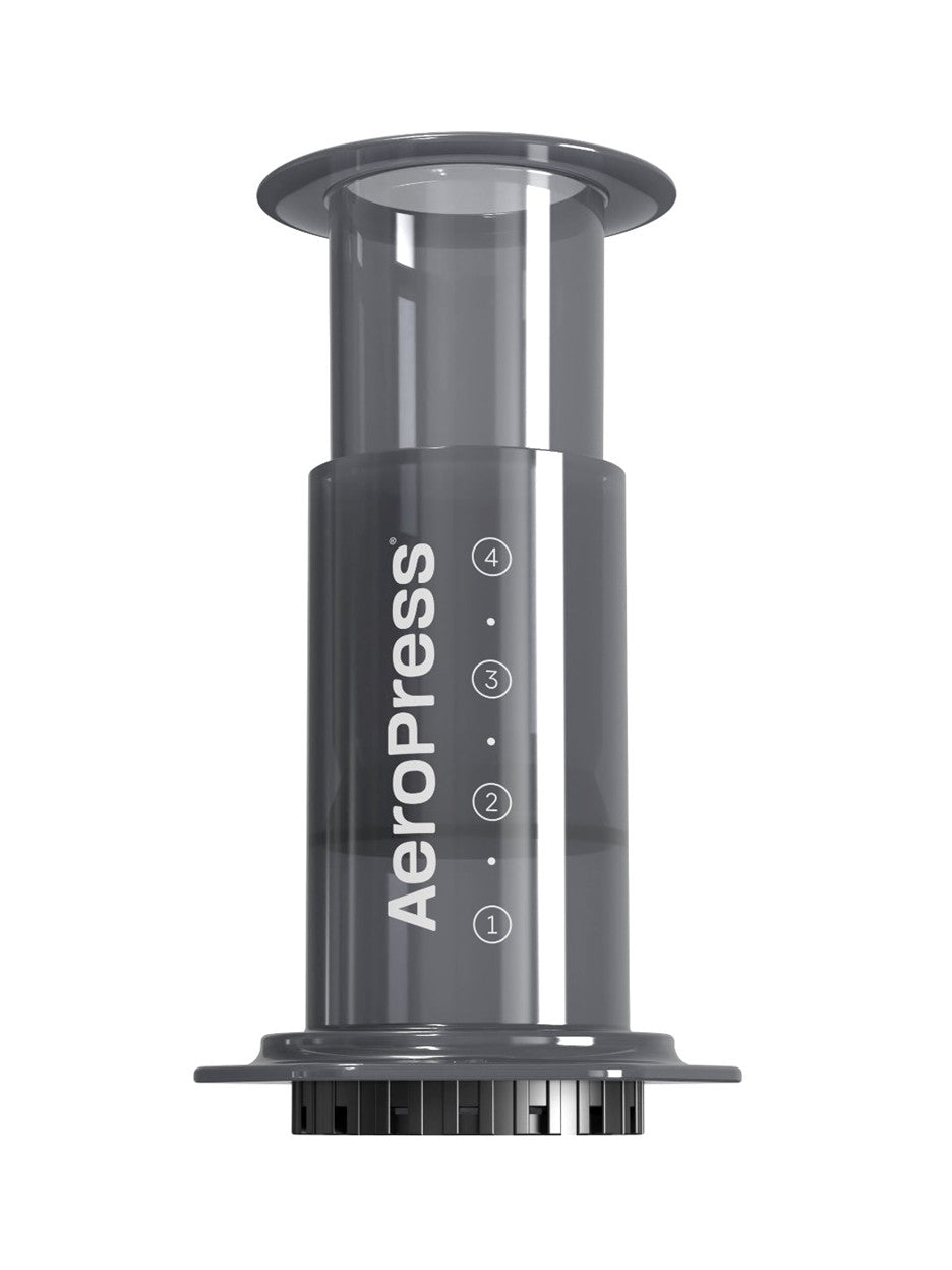 Gray Aeropress coffee maker on a white background