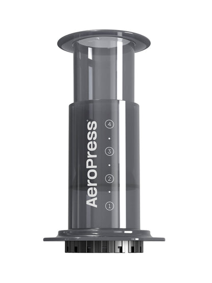 Gray Aeropress coffee maker on a white background