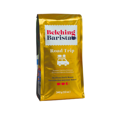 A 340g bag of Belching Barista Road Trip medium dark roast coffee in a metallic gold foil bag, shown on a plain white background.