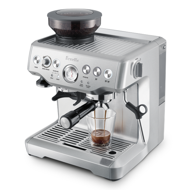 Breville espresso machine with a glass of coffee on a white background Top angle