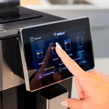 Person interacting with a Bellucci espresso machine's digital display panel, showing the brand 'Bellucci'.