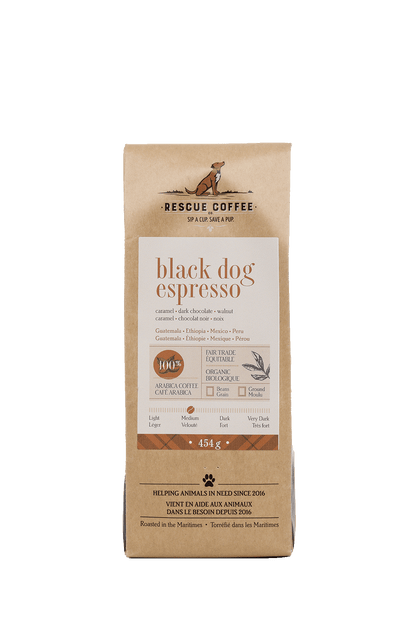 Bag of black dog espresso coffee with 'Rescue Coffee' branding on a black background