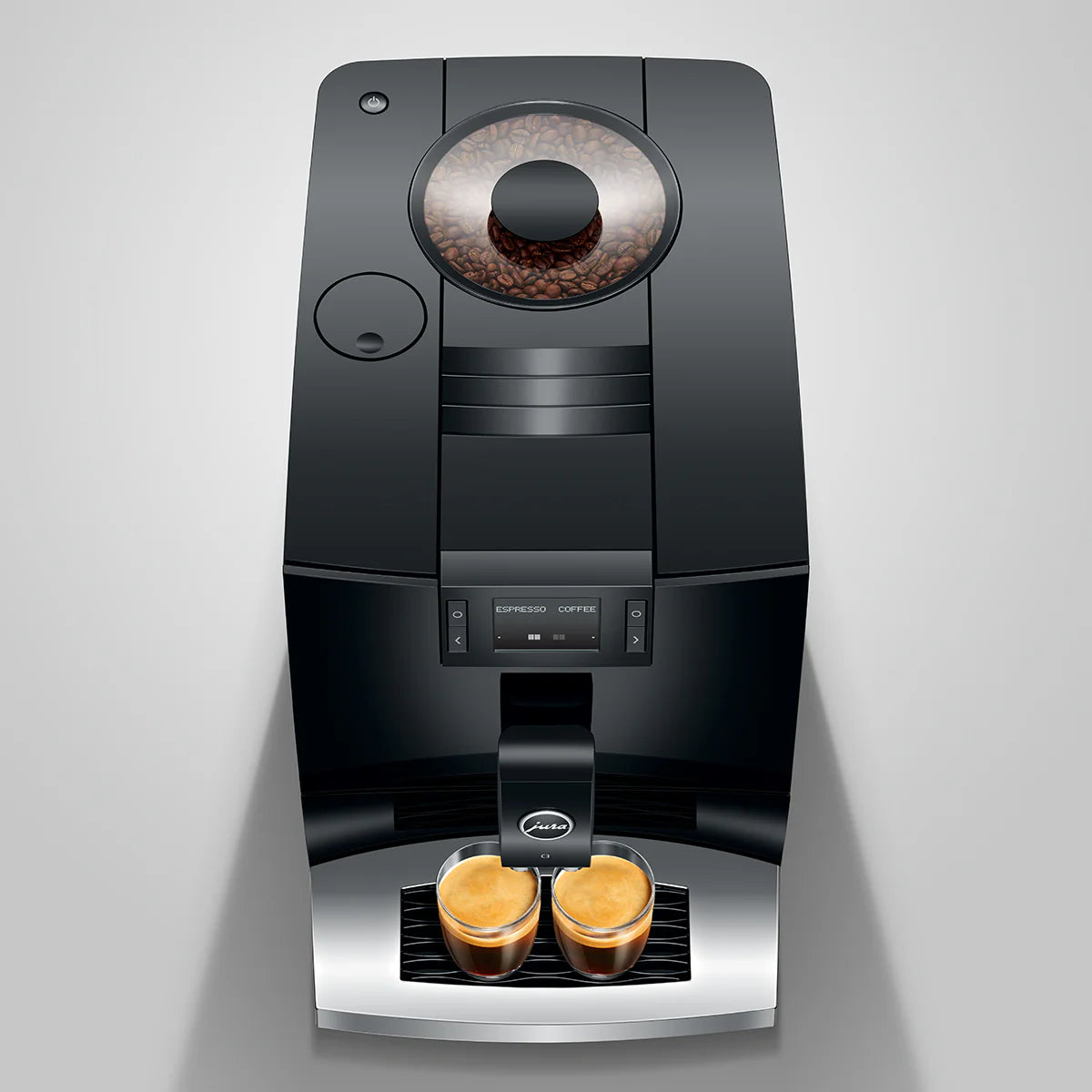 Coffee machine with two glasses of coffee on a gray background