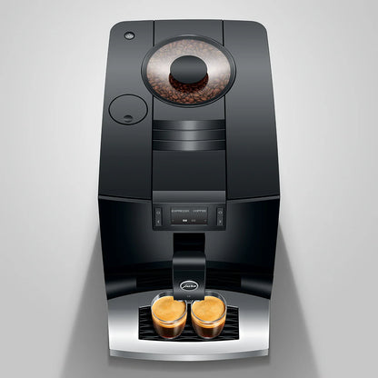 Coffee machine with two glasses of coffee on a gray background