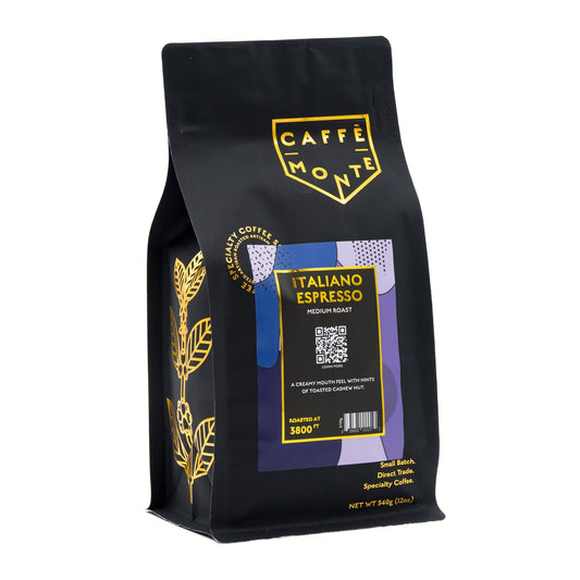 Caffe Monte Italiano Espresso coffee bag with gold accents, gold floural images along the side on a white background