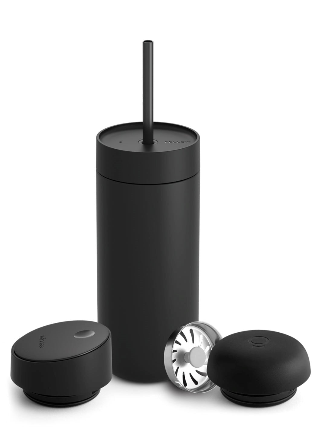 Black tumbler with various lids and a straw on a white background
