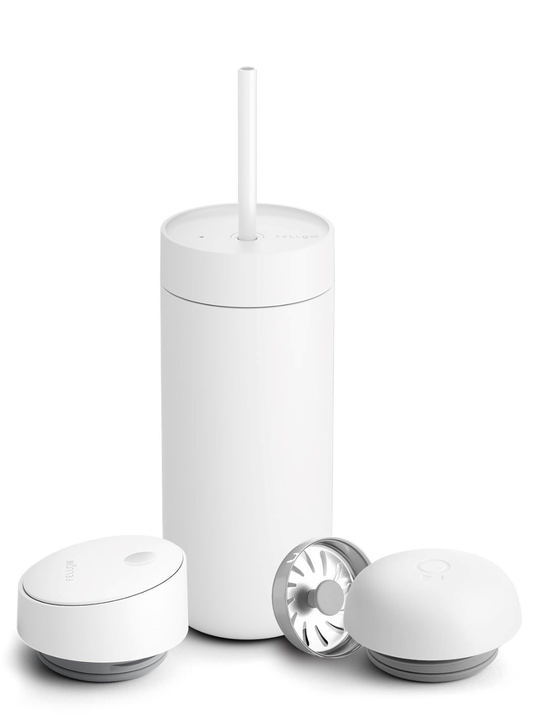 White tumbler with straw and detachable lid on a white background