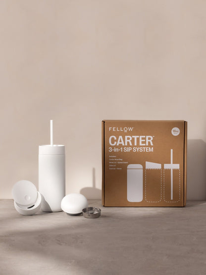 Fellow Carter 3-in-1 Sip System packaging with components on a neutral background