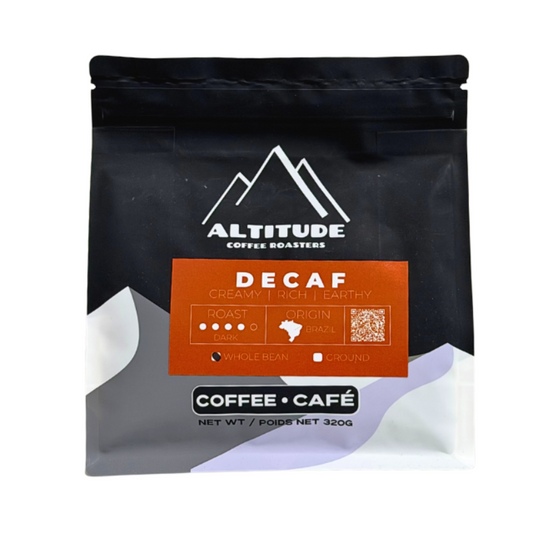 A 320g bag of Altitude Coffee Roasters Decaf Coffee, shown in its black resealable packaging with an orange and white label on a plain white background.