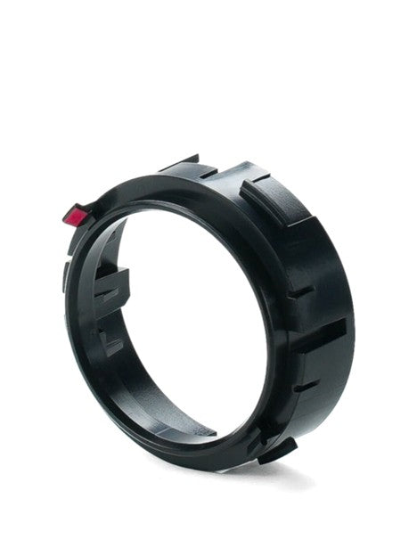 Black coffee grinder component on a white background