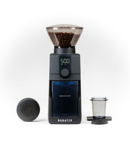 Baratza coffee grinder with accessories on a white background