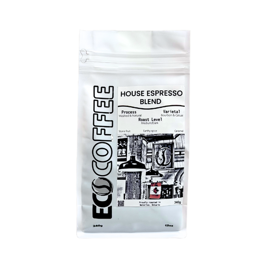 A 340g stand-up pouch of ECO COFFEE House Espresso Blend, featuring a white packaging design with black text and a black-and-white graphic illustration on the front.