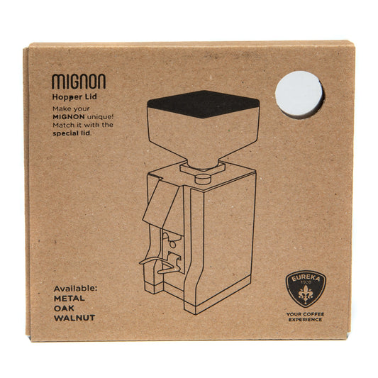 Cardboard packaging for a coffee grinder with 'Mignon' branding and product illustration.
