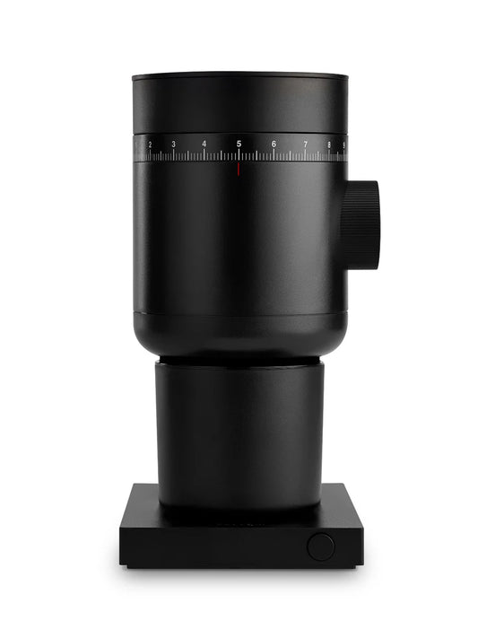 Black coffee grinder on a white background