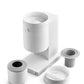 White Fellow Opus coffee grinder with accessory dosing cups and lid on a white background