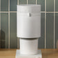 Matte White coffee grinder on a wooden surface with tiled wall background