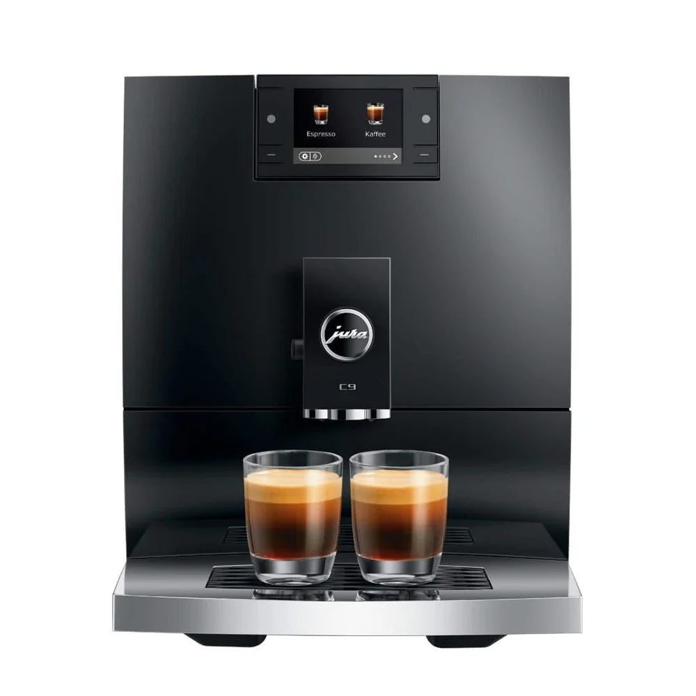 Black coffee machine with two glasses of coffee on a white background
