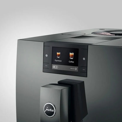 Gray coffee machine with digital display on a white background