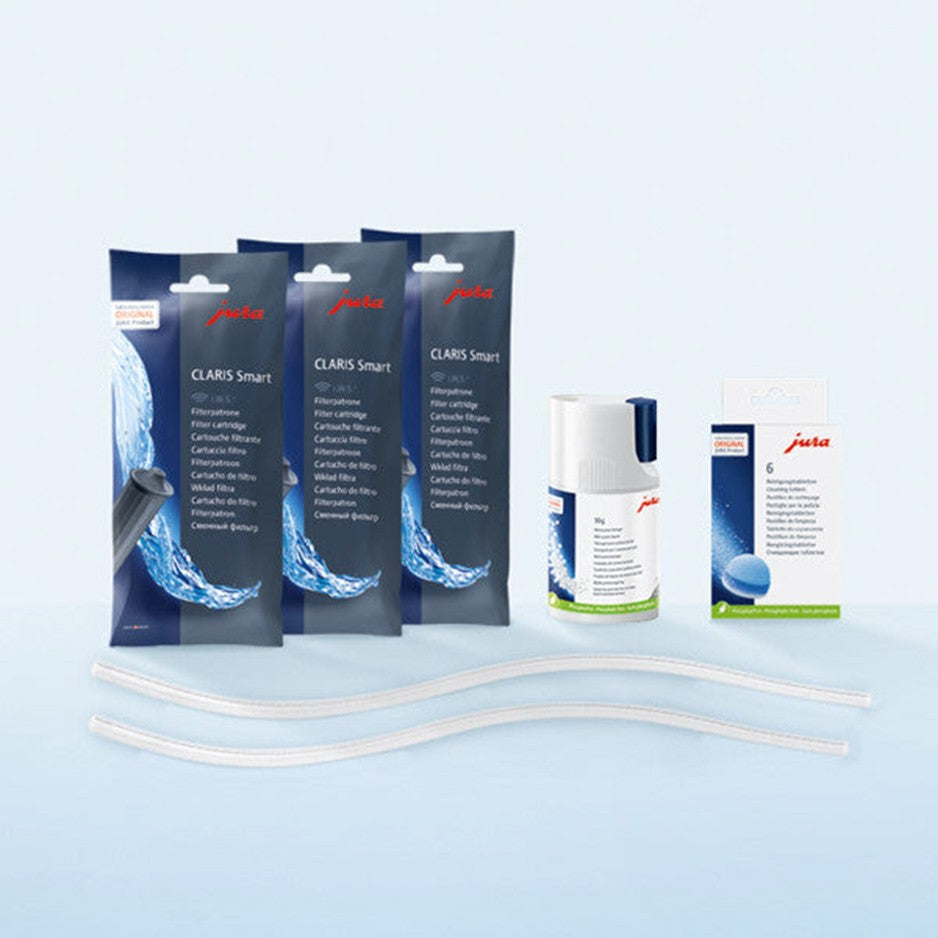 Jura Claris Smart coffee machine components on a light blue background