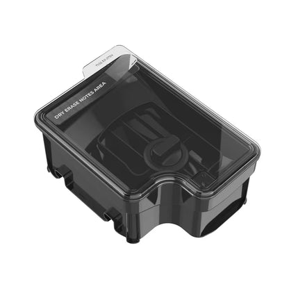 Black plastic container with a clear lid on a white background