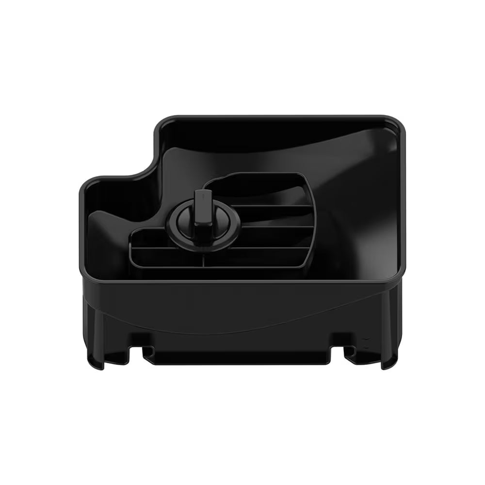 Black plastic component on a white background
