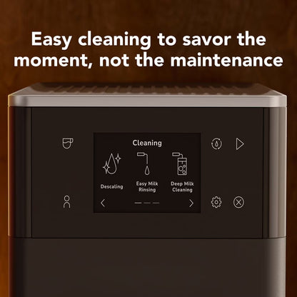 Close-up of a coffee machine control panel with the text 'Easy cleaning to savor the moment, not the maintenance' above it. The machine has a dark front display showing cleaning options such as descaling, easy milk rinsing, and deep milk cleaning.
