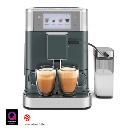 Modern coffee machine with two cups of coffee and a milk container on a white background