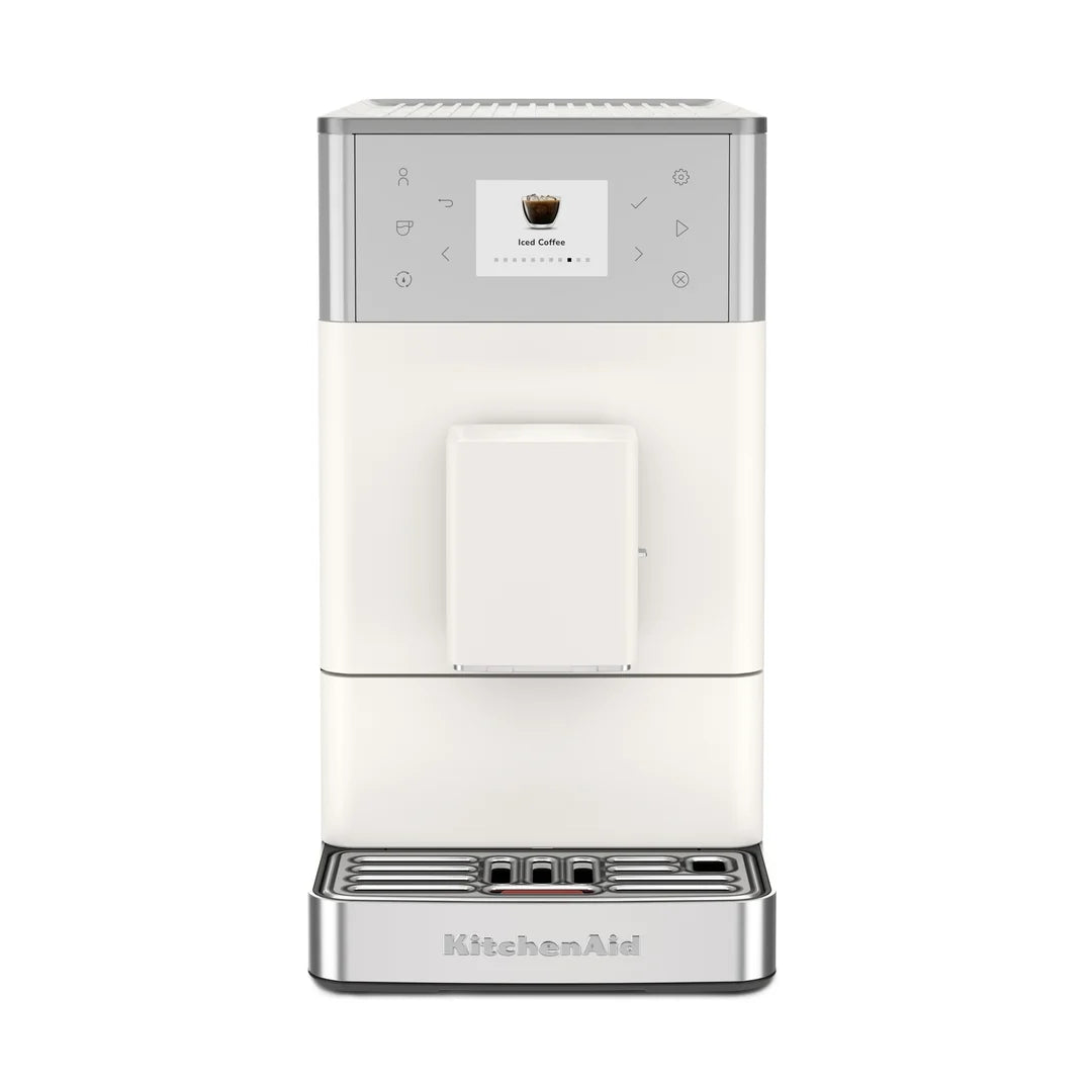 A KitchenAid coffee machine in off-white and silver, featuring a digital touch screen and drip tray, shown against a plain white background.