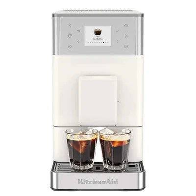 KitchenAid coffee machine with two glasses of coffee on a white background