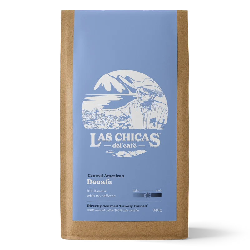 A 340g bag of Las Chicas del cafe Decaf coffee in a brown kraft paper bag with a light blue label and white graphic.